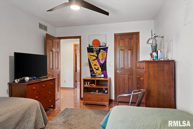 1405 Woods Farm Ln, Springfield, IL 62704 - bedroom featuring wood finished floors and ceiling fan