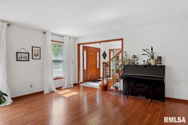 1405 Woods Farm Ln, Springfield, IL 62704 - entryway with hardwood / wood-style flooring, baseboards, and stairs