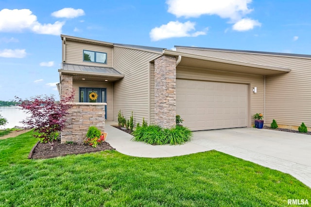 321 Harbor Point Pl, Springfield, IL 62712 - mid-century inspired home featuring a standing seam roof, metal roof, an attached garage, and a front lawn