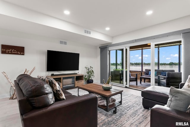 321 Harbor Point Pl, Springfield, IL 62712 - living area featuring recessed lighting, light wood-type flooring, and baseboards