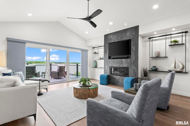 321 Harbor Point Pl, Springfield, IL 62712 - living room featuring ceiling fan, high vaulted ceiling, a premium fireplace, wood finished floors, and recessed lighting