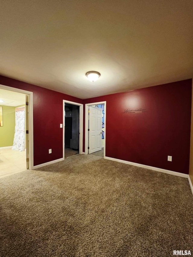 514 W Washington St, Mendon, IL 62351 - carpeted empty room featuring baseboards