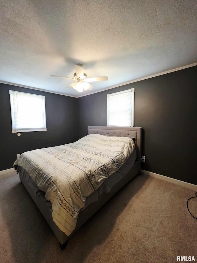 514 W Washington St, Mendon, IL 62351 - carpeted bedroom with a textured ceiling, crown molding, a ceiling fan, and baseboards