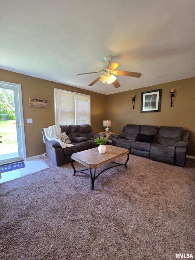 514 W Washington St, Mendon, IL 62351 - living room featuring carpet, ceiling fan, and baseboards