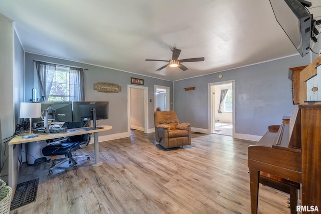 309 W State St, Payson, IL 62360 - office space featuring ceiling fan, wood finished floors, baseboards, and crown molding