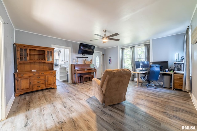 309 W State St, Payson, IL 62360 - living area featuring an office area, light wood-type flooring, and a ceiling fan