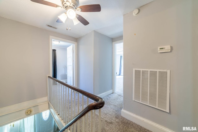 309 W State St, Payson, IL 62360 - hallway with carpet, an upstairs landing, and baseboards