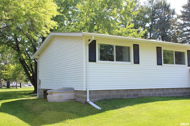 214 W B St, Alpha, IL 61413 - view of home's exterior featuring a lawn
