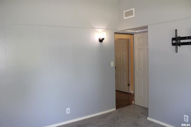 214 W B St, Alpha, IL 61413 - unfurnished room featuring carpet floors and baseboards
