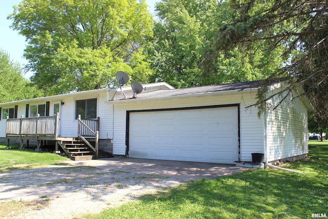 214 W B St, Alpha, IL 61413 - ranch-style home featuring driveway and a front lawn