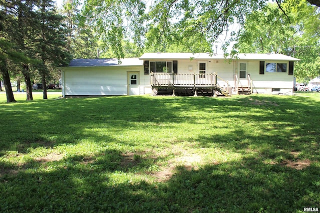 214 W B St, Alpha, IL 61413 - rear view of house with a yard and a wooden deck