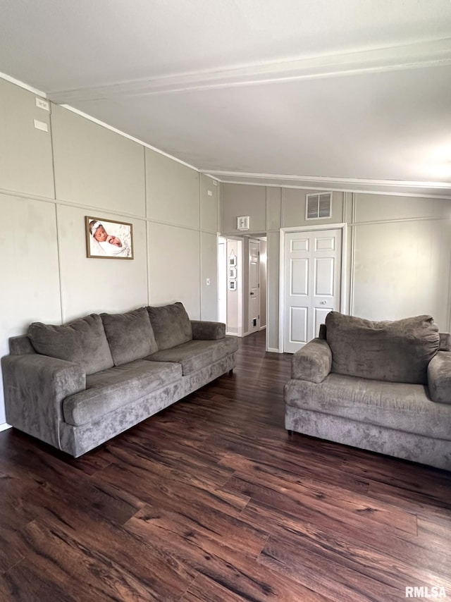 209 Brookview Dr, Abingdon, IL 61410 - living room featuring wood finished floors, ornamental molding, and a decorative wall