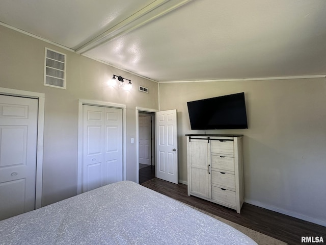 209 Brookview Dr, Abingdon, IL 61410 - bedroom featuring dark wood-style flooring, lofted ceiling, baseboards, and ornamental molding