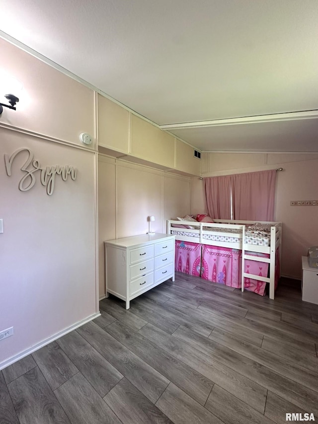 209 Brookview Dr, Abingdon, IL 61410 - unfurnished bedroom with dark wood-style flooring