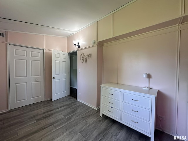 209 Brookview Dr, Abingdon, IL 61410 - unfurnished bedroom featuring dark wood-style flooring