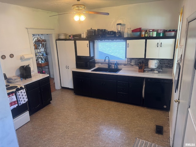 3210 Rendlen Ave, Hannibal-Mo, MO 63401 - kitchen featuring a sink, black appliances, dark cabinetry, backsplash, and light countertops