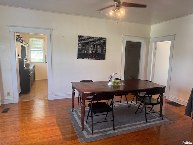 3210 Rendlen Ave, Hannibal-Mo, MO 63401 - dining space featuring ceiling fan, wood finished floors, and baseboards