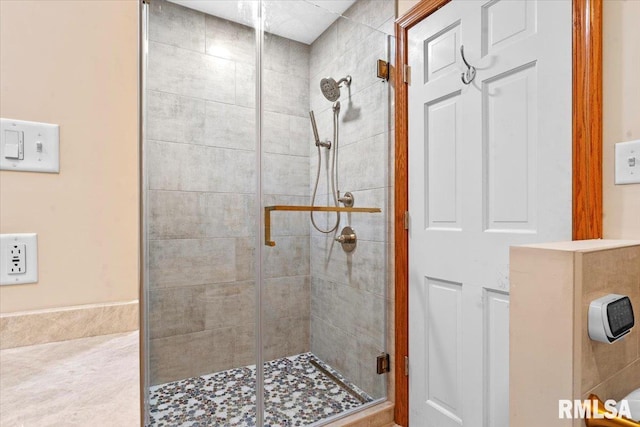 full bathroom featuring a stall shower