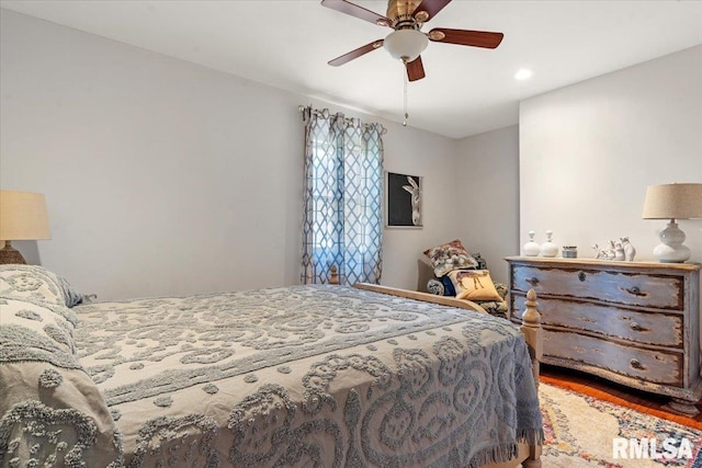 bedroom with wood finished floors, recessed lighting, and a ceiling fan