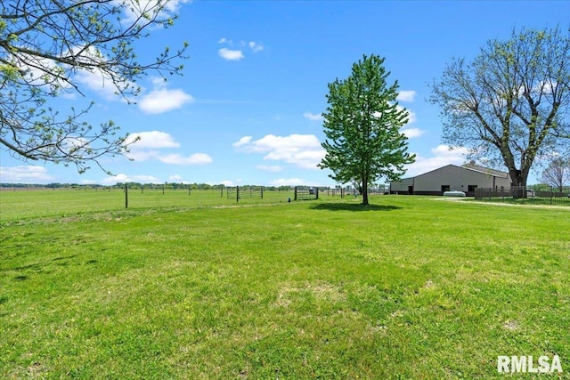 view of yard featuring a view of rural / pastoral area