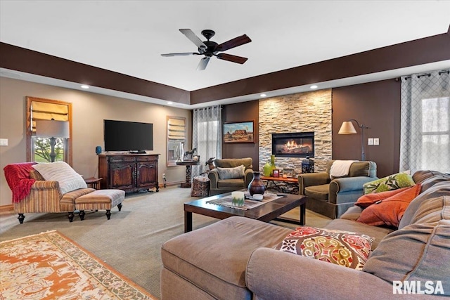 living area with light carpet, baseboards, a ceiling fan, and recessed lighting