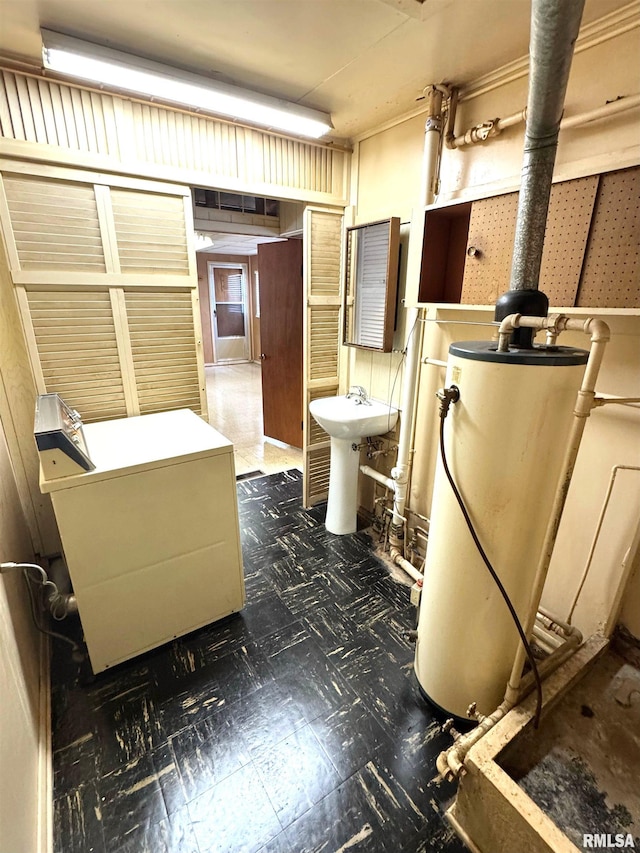 461 W Fremont St, Galesburg, IL 61401 - bathroom with tile patterned floors and gas water heater