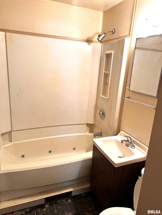 461 W Fremont St, Galesburg, IL 61401 - full bath featuring a combined bath / shower with jetted tub, vanity, and toilet