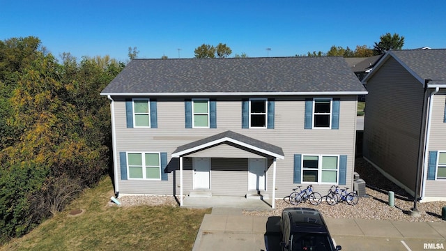 4609 State St, Quincy, IL 62301 - view of front of property with a front yard and a shingled roof