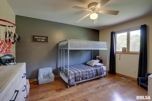 4629 Hidden Cove Rd, Quincy, IL 62305 - bedroom featuring light wood-type flooring, baseboards, and ceiling fan