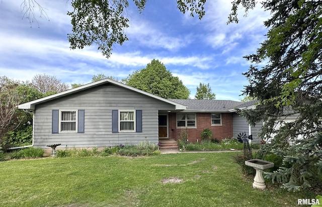 810 NW 7th Ave, Galva, IL 61434 - ranch-style house with a front lawn and brick siding