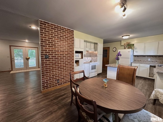 810 NW 7th Ave, Galva, IL 61434 - dining room with dark wood finished floors and baseboards
