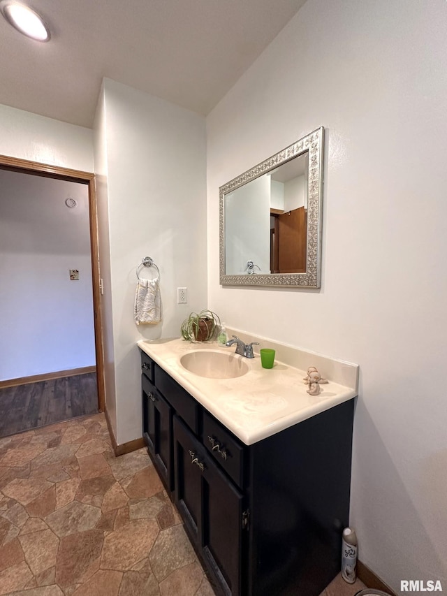 810 NW 7th Ave, Galva, IL 61434 - bathroom with stone finish floors and vanity