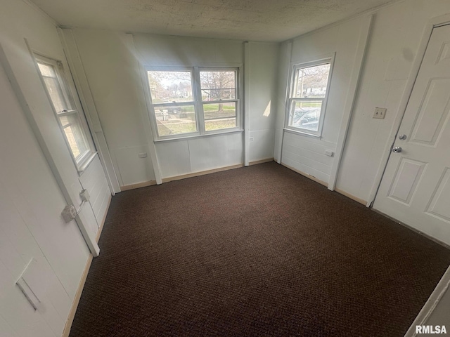859 Mulberry St, Galesburg, IL 61401 - empty room with dark carpet