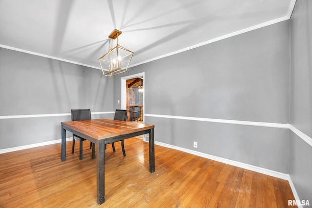 2255 N Broad St, Galesburg, IL 61401 - office with baseboards, a chandelier, ornamental molding, and light wood-style floors