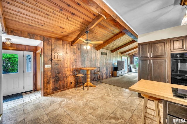 2255 N Broad St, Galesburg, IL 61401 - kitchen with wood walls, ceiling fan, and wooden ceiling