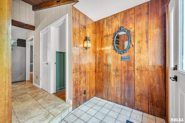 2255 N Broad St, Galesburg, IL 61401 - corridor with wood walls, tile patterned floors, and beam ceiling