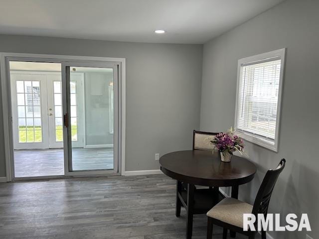 818 Van Buren St, Quincy, IL 62301 - dining area with healthy amount of natural light, baseboards, wood finished floors, and recessed lighting