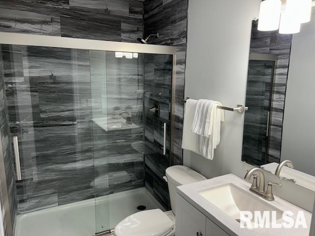 818 Van Buren St, Quincy, IL 62301 - bathroom with toilet, a stall shower, and vanity