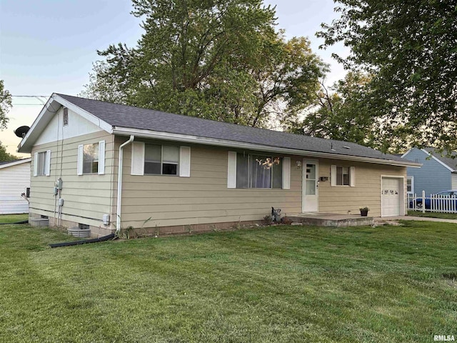 1744 Jackson St, Quincy, IL 62301 - single story home with a front lawn, a garage, and roof with shingles