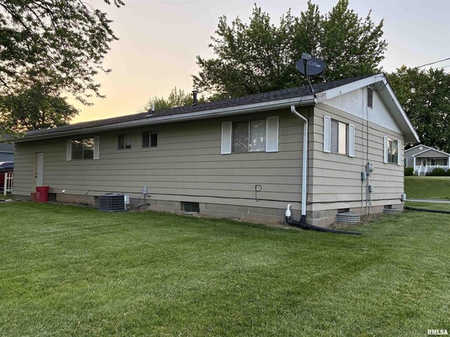 1744 Jackson St, Quincy, IL 62301 - view of side of property featuring cooling unit and a yard