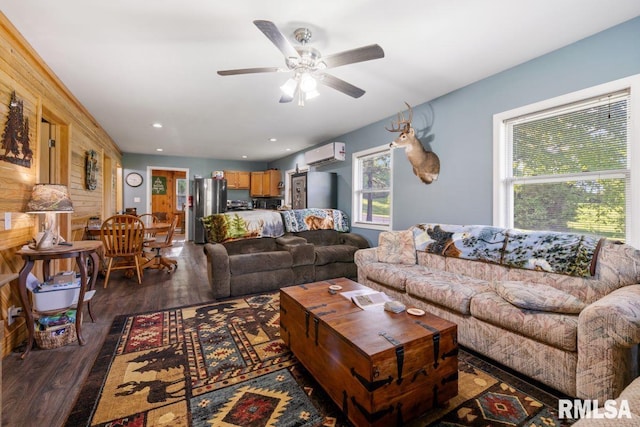 1460 Rushing Rd, Simpson, IL 62985 - living area with a wall mounted air conditioner, dark wood finished floors, and ceiling fan