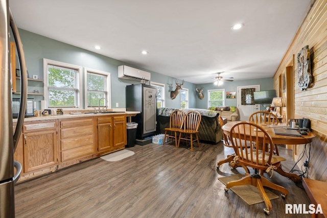 1460 Rushing Rd, Simpson, IL 62985 - dining space featuring a wall mounted air conditioner, wood finished floors, ceiling fan, and recessed lighting