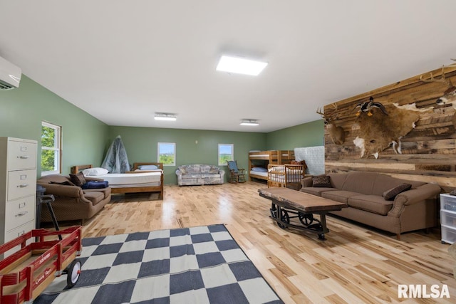 1460 Rushing Rd, Simpson, IL 62985 - living room featuring wood finished floors and a wall unit AC