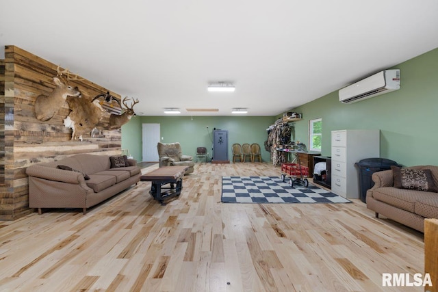 1460 Rushing Rd, Simpson, IL 62985 - living room featuring a wall mounted air conditioner and wood finished floors