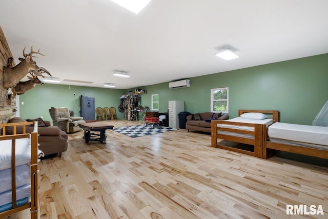 1460 Rushing Rd, Simpson, IL 62985 - living room featuring a wall mounted air conditioner and wood finished floors