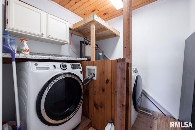 1460 Rushing Rd, Simpson, IL 62985 - laundry room featuring cabinet space, washing machine and clothes dryer, wood finished floors, and wooden ceiling