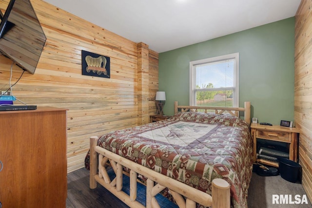 1460 Rushing Rd, Simpson, IL 62985 - bedroom with wood walls, an accent wall, and wood finished floors