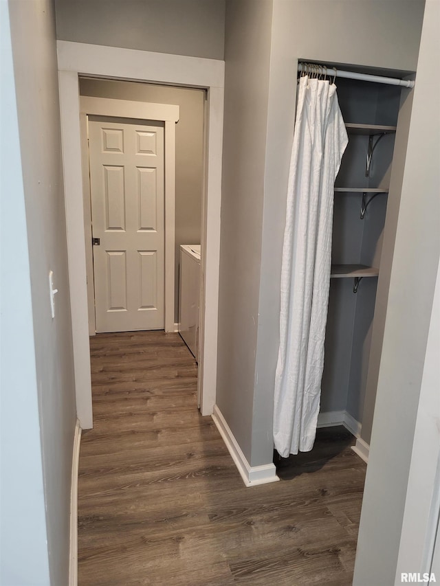 718 Adams St, Quincy, IL 62301 - hall featuring dark wood-style flooring, separate washer and dryer, and baseboards