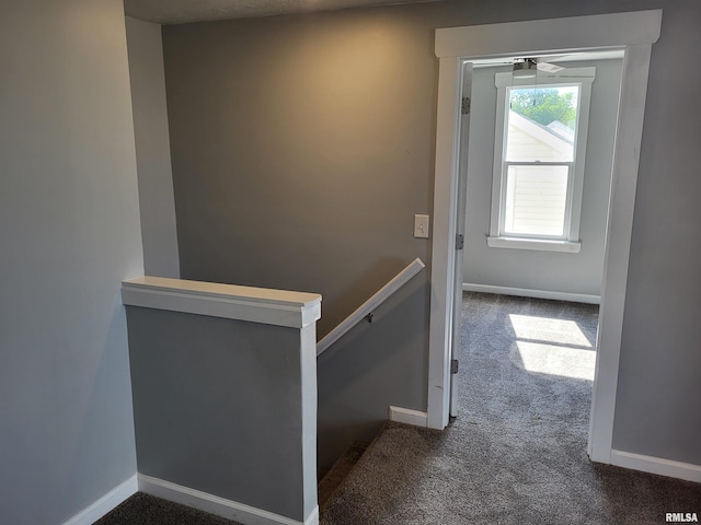 718 Adams St, Quincy, IL 62301 - hall featuring carpet flooring, baseboards, and an upstairs landing