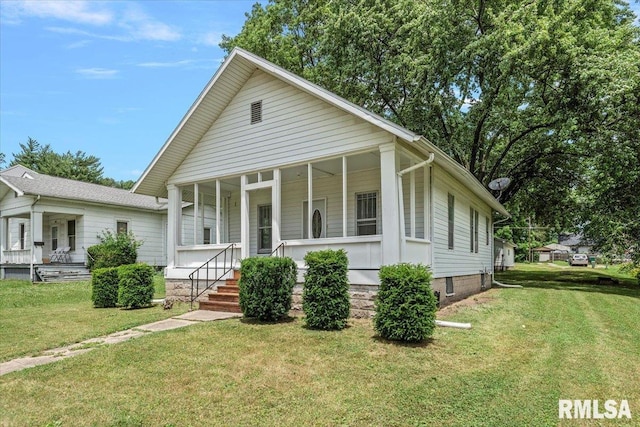 708 E 5th St, Pana, IL 62557 - view of front facade with a porch and a front lawn